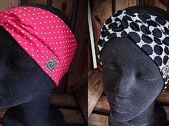 Turban-Stirnband in leuchtendem Pink mit weißen Punkten und Stirnband mit markantem schwarz-weißen Grafik-Print